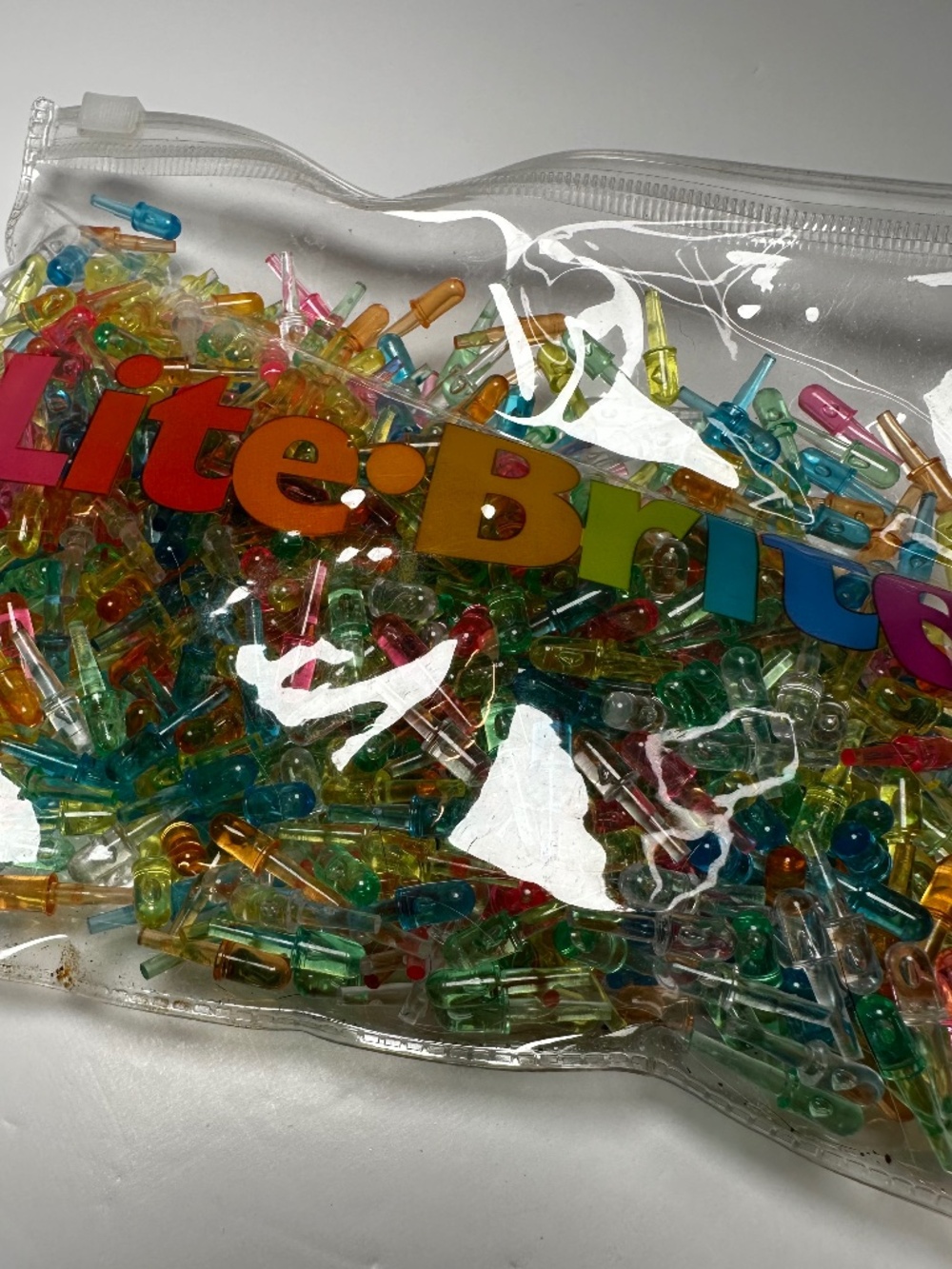 Lite-Brite 1,260 Mini Peg Refill Set | Mixed Colour Replacement Pegs + Bag